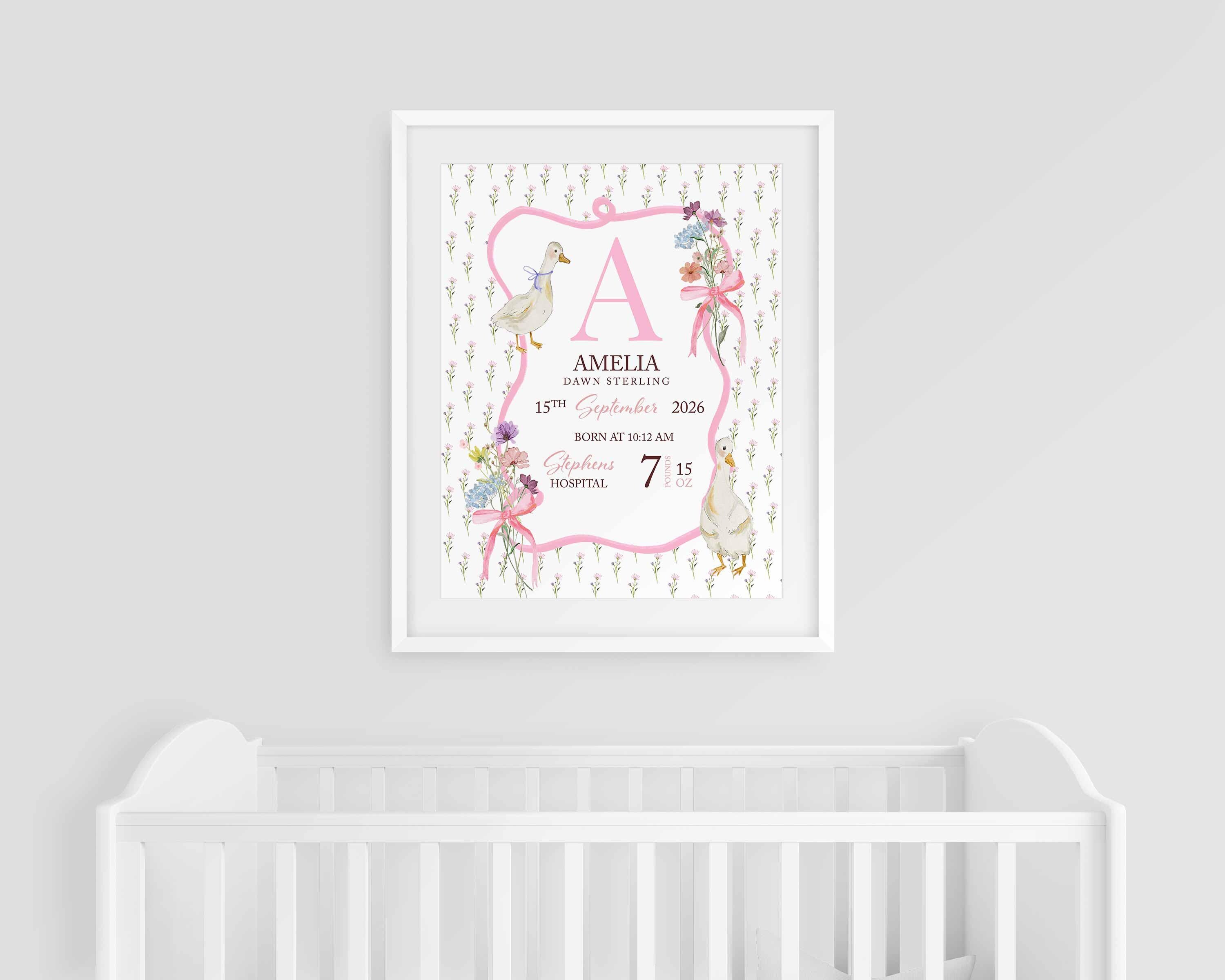 Personalised birth stats print with a painted goose and bows, hanging above a crib
