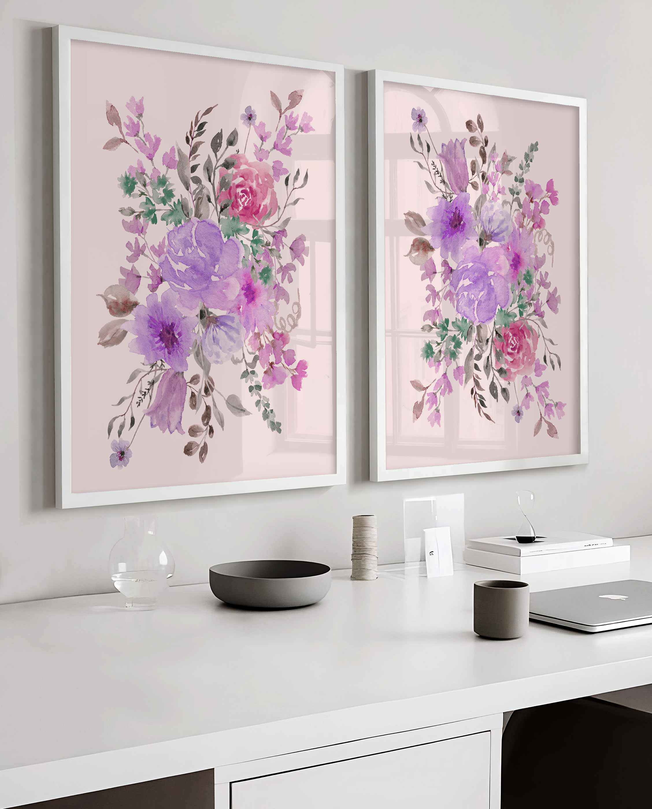 Lilac abstract floral prints above a white desk
