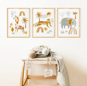 Giraffe, leopard and elephant boho safari prints above a wooden stool