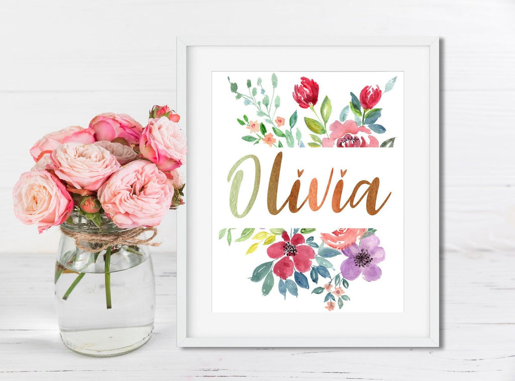 Name print Olivia in gold between watercolour flowers, beside a vase of pink roses