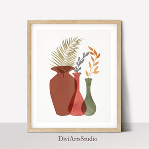 Three terracotta and sage vases with dried palm and autumn stems, wooden frame