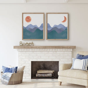Blue mountains with a terracotta sun and a crescent moon above a fireplace
